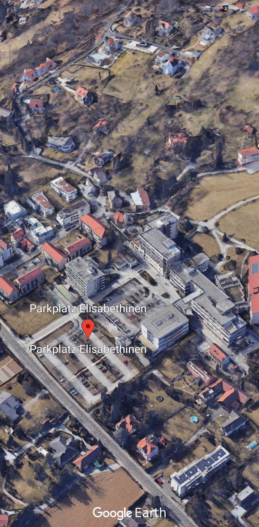 Satellitenansicht des Krankenhauses in Eggenberg, mit umliegenden Häusern.